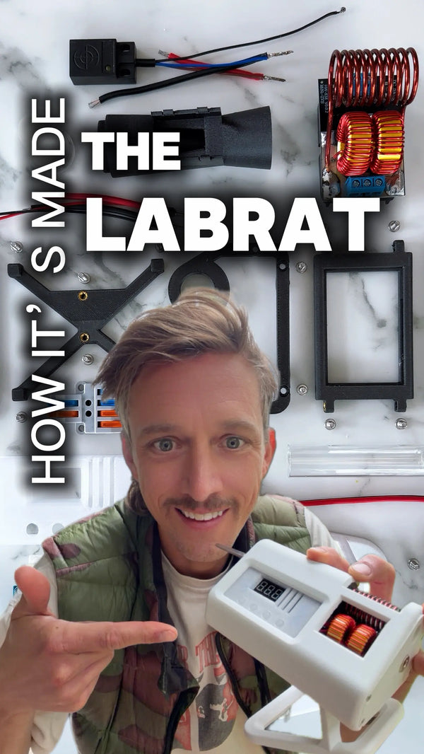 Person holding a small electronic device with text 'The Labrat' and 'How It's Made' on a background of electronic components.