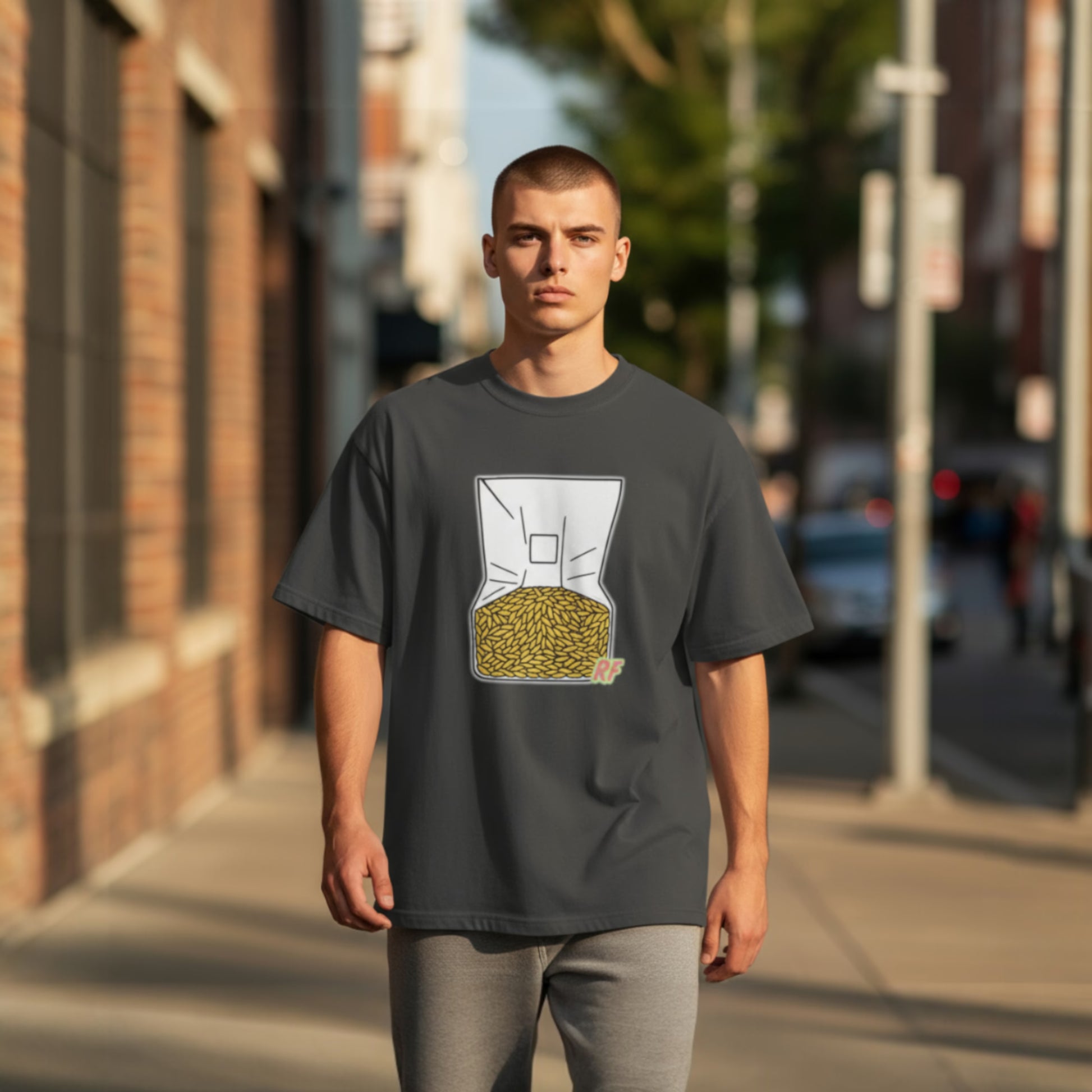 Faded Black t-shirt with a graphic of a bag of chips on a white background