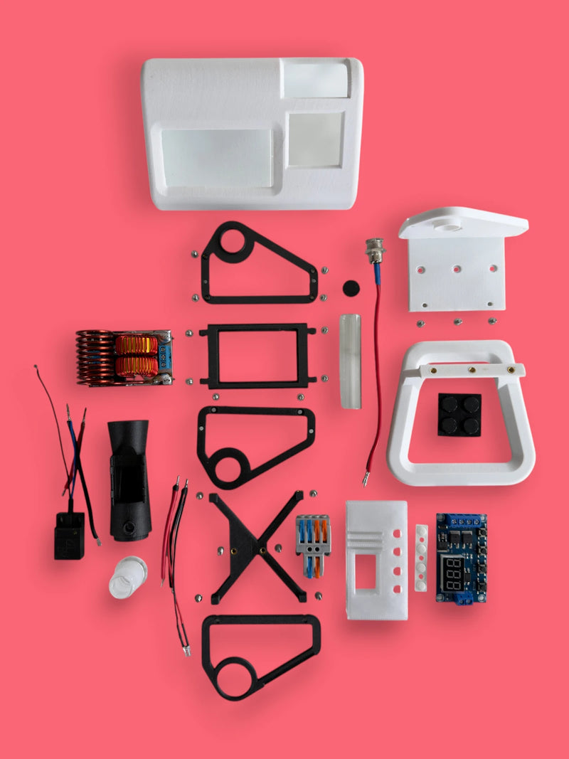 A photo of all the internal parts and pieces of a white mycology and lab tool sterilizer on a white gradient background