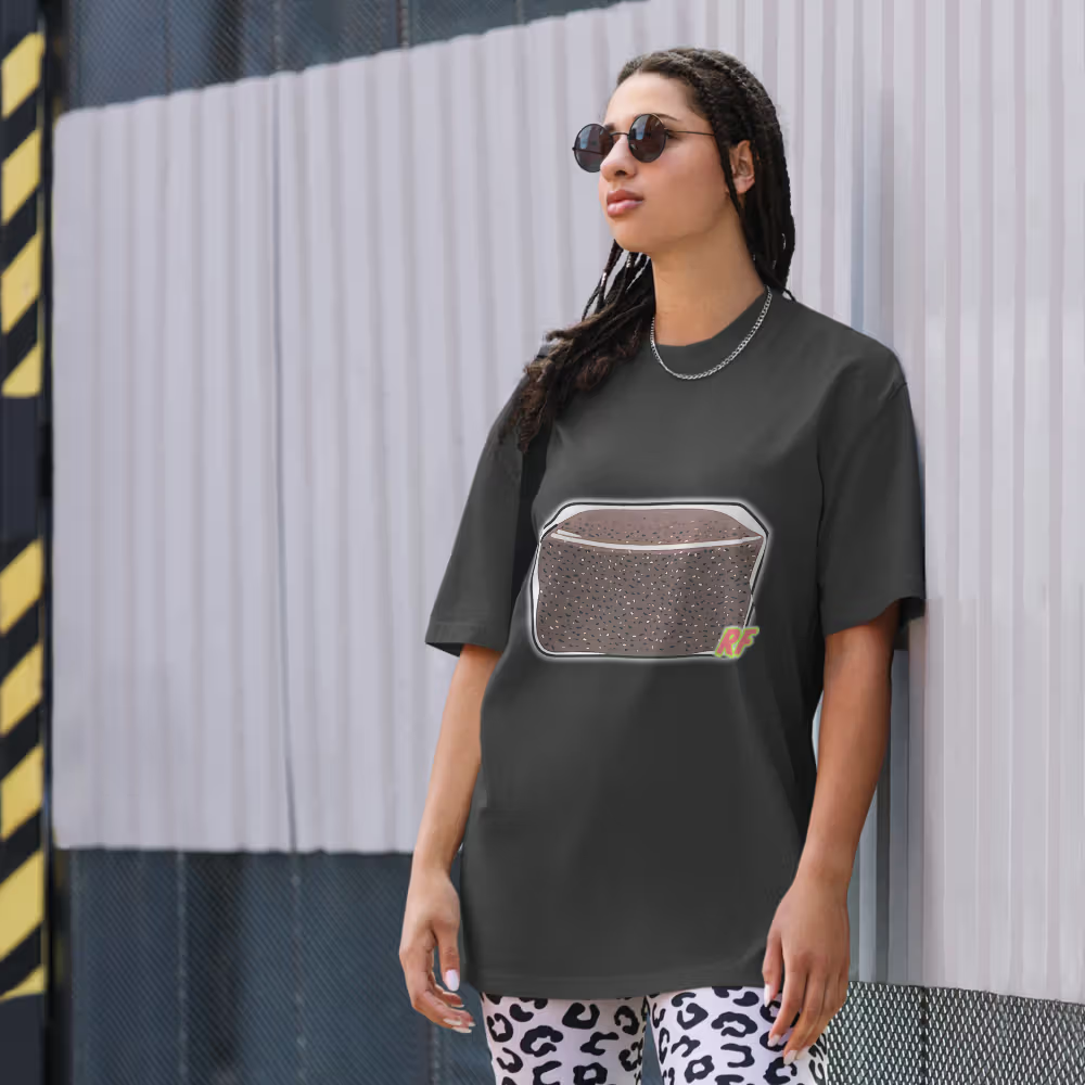 Girl wearing black CVG Tek Oversized Tee