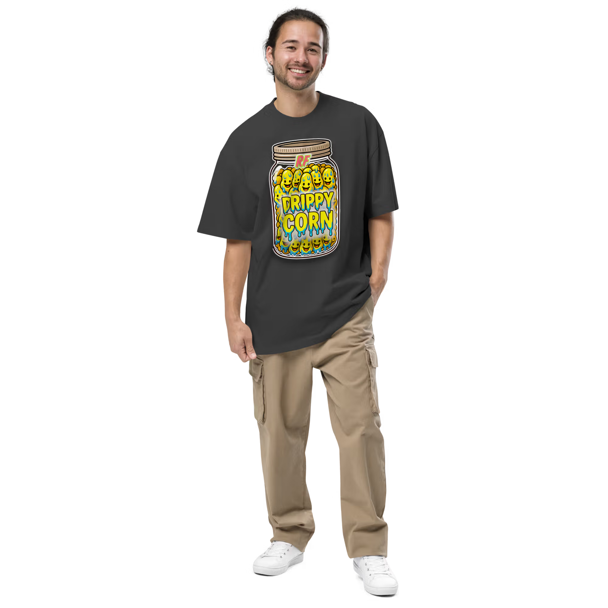 Person wearing a faded black oversized t-shirt with 'Drippy Corn' design