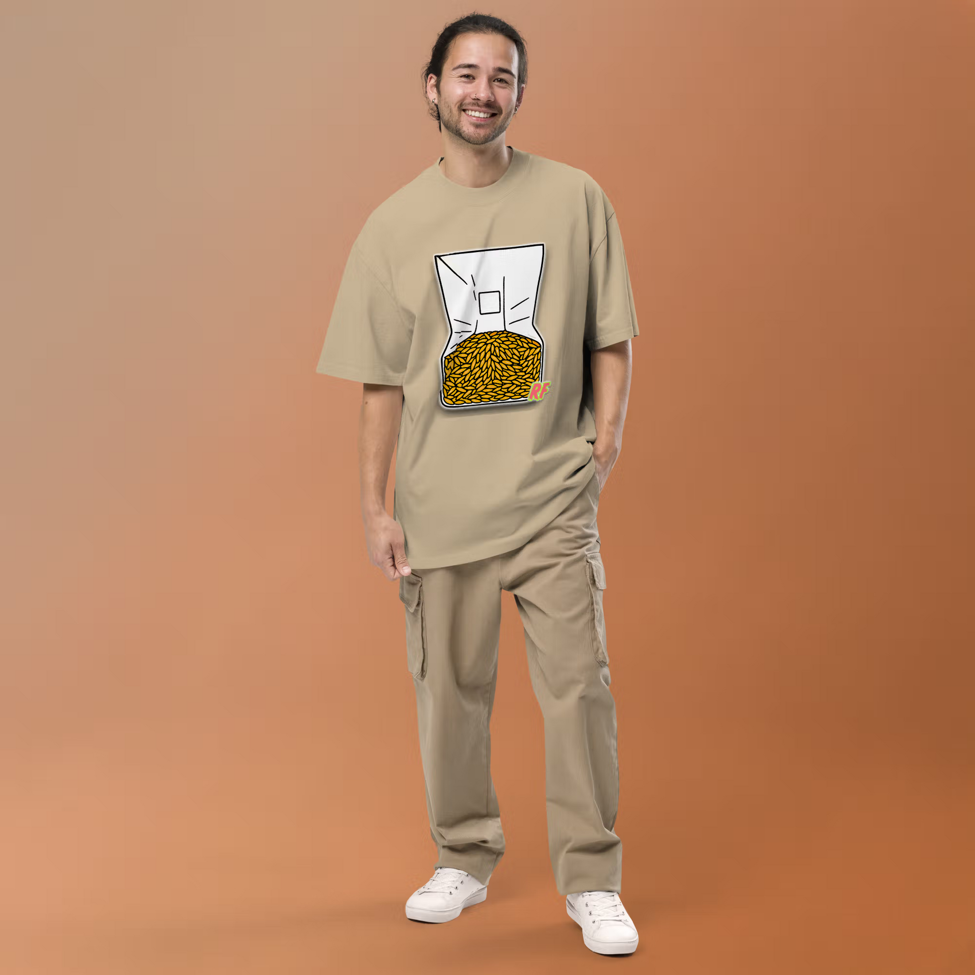 Man wearing Faded Khaki Grain Spawn Oversized T-shirt